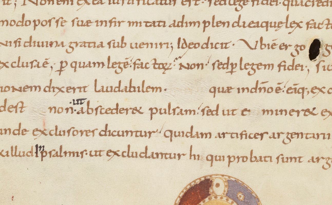 Scratched-out letters on fol. 22v.