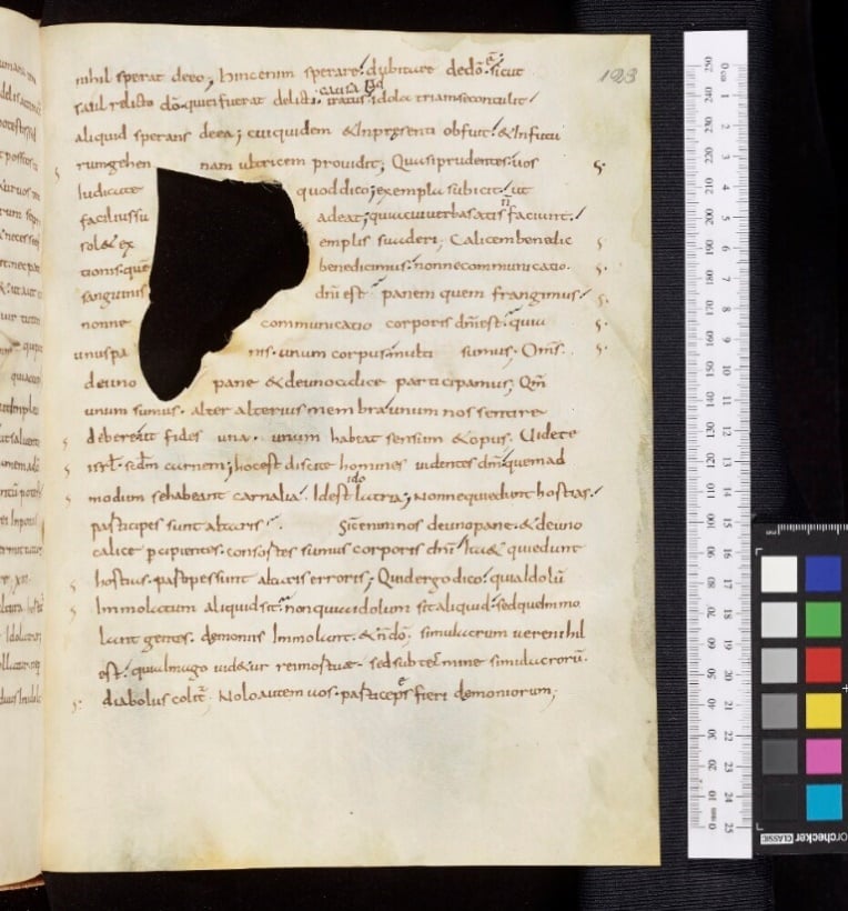 Ninth-century manuscript containing a commentary by Rabanus Maurus on Paul's Epistles, featuring a large hole: Oxford, Bodleian Library, MS. Laud Misc. 106, fol. 123r